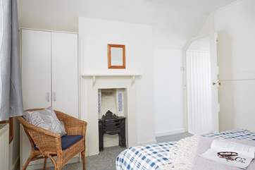 The double bedroom has a handy en suite and traditional features.