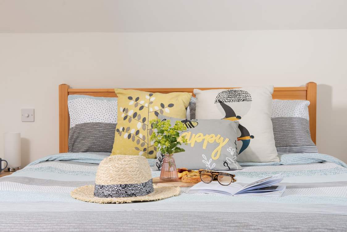 The beds are beautifully dressed.