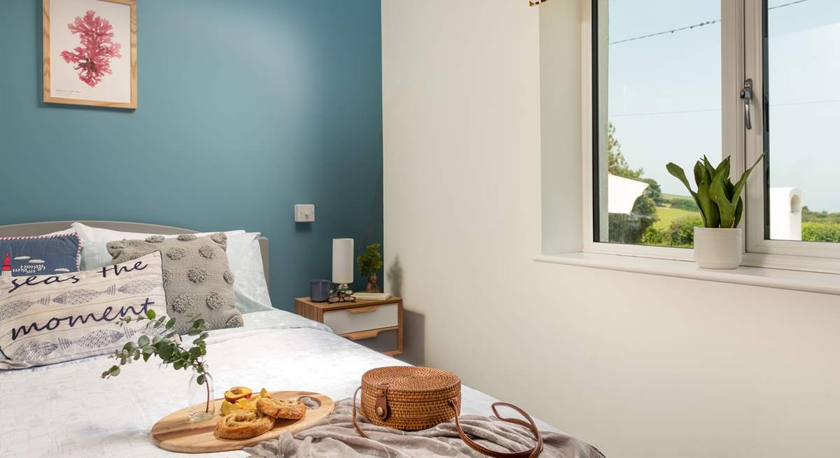 Bedroom one has wonderfully far reaching views out to sea.