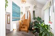 The green fingered owners have a fabulous display of plants, both inside and out.