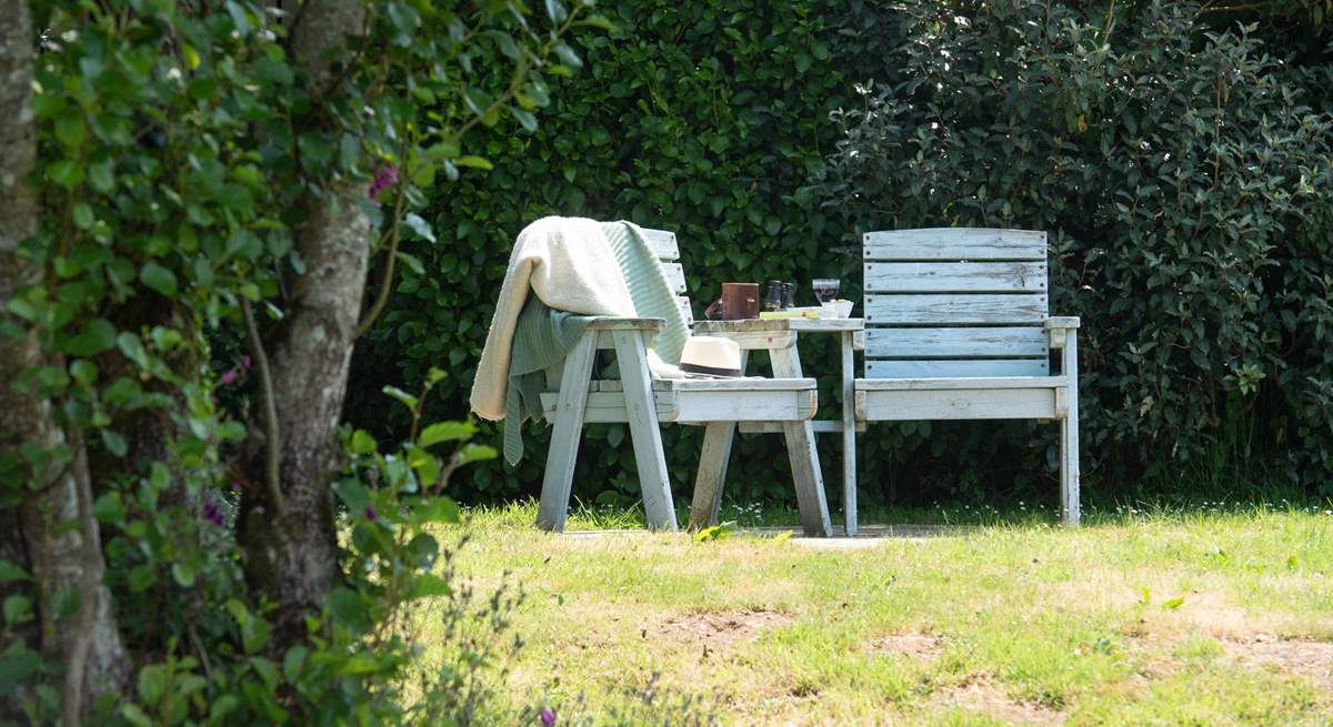 The garden offers a choice of places to sit out and relax.