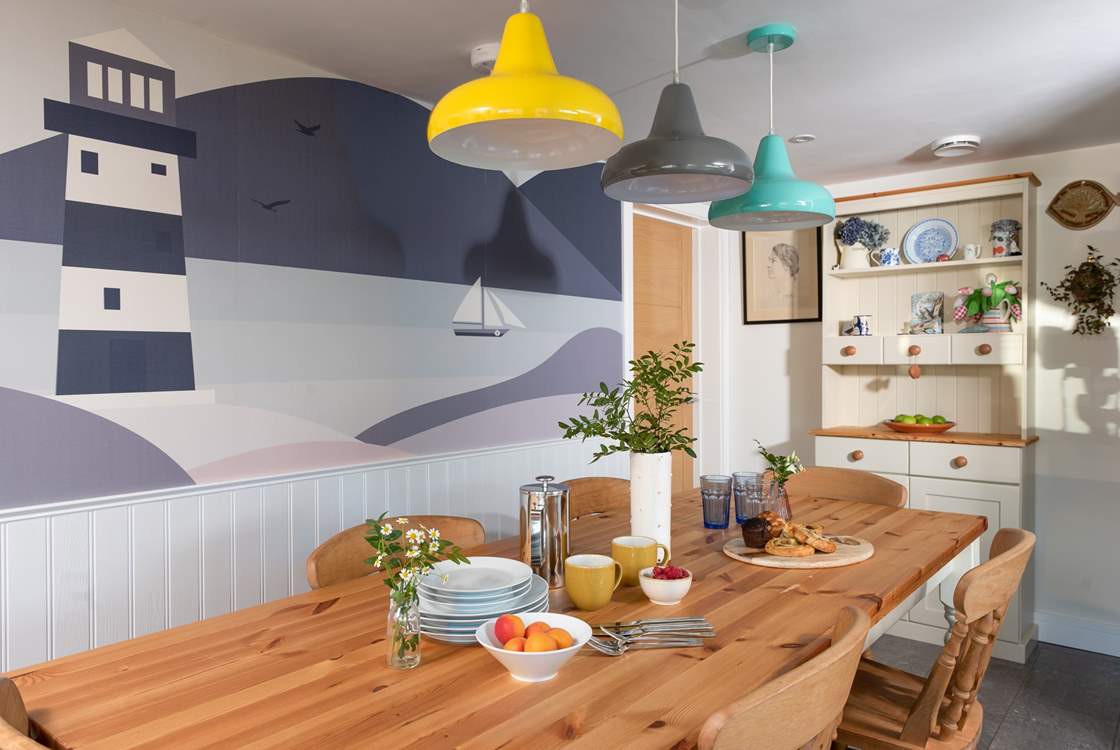 The utility-area leads off the from the dining-area.