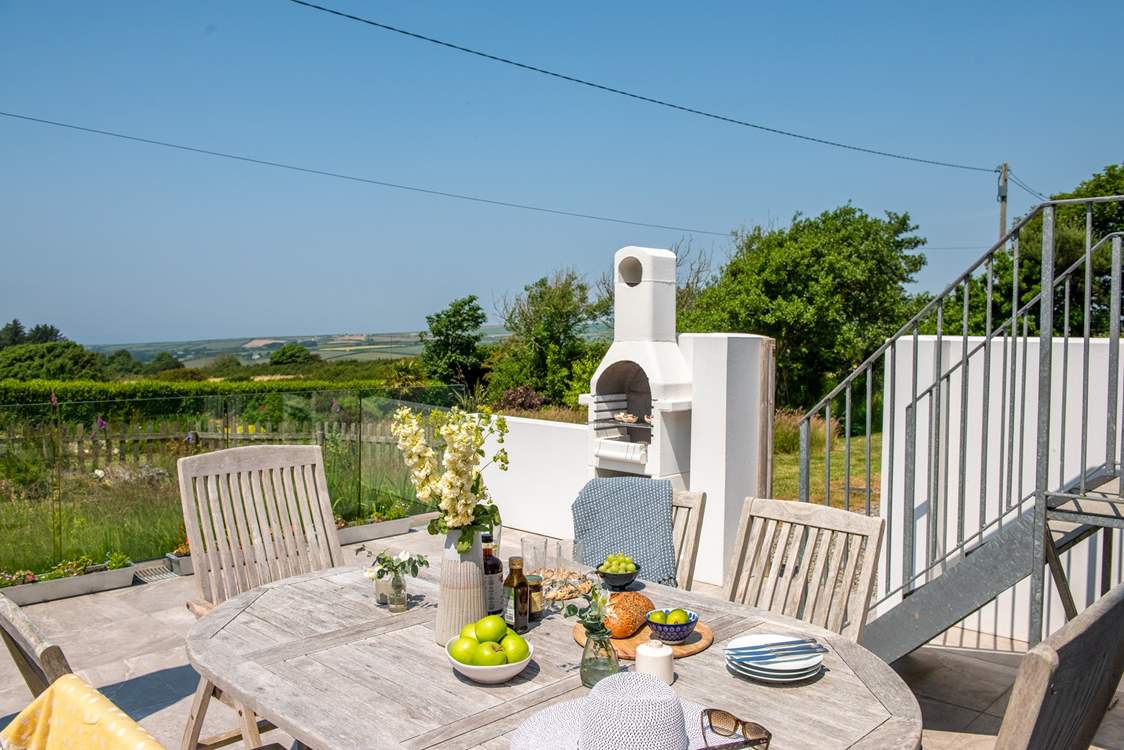 Steps from the sitting-room, lead you down to the sunny terrace
