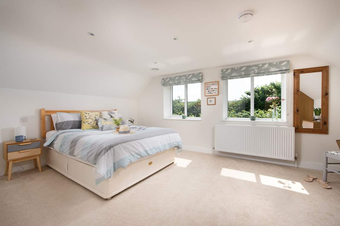 The second bedroom is incredibly spacious and wonderfully light and airy.