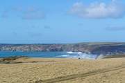Endless glorious golden sands and rolling surf at Newgale beach.