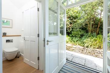 The ground floor cloakroom has a WC and wash-basin.