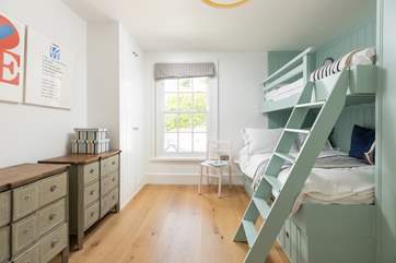 Pretty bedroom 2 has bunk-beds with a 4ft bottom bunk and 3ft top. Please note, this room is only suitable for two guests.