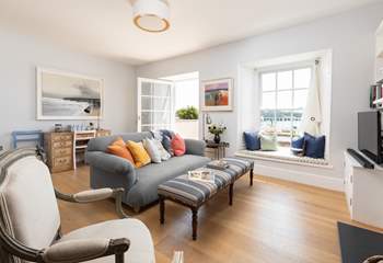 Gorgeous contemporary furnishings await in the open plan living area. 