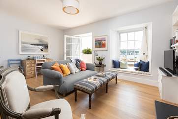 Gorgeous contemporary furnishings await in the open plan living area.
