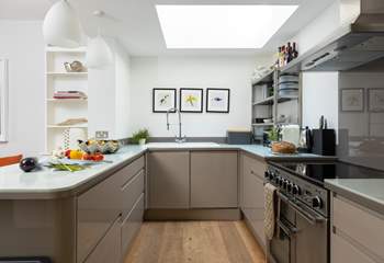 The stylish kitchen area has all the equipment you will need to cook a holiday meal. 