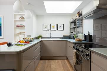 The stylish kitchen area has all the equipment you will need to cook a holiday meal.