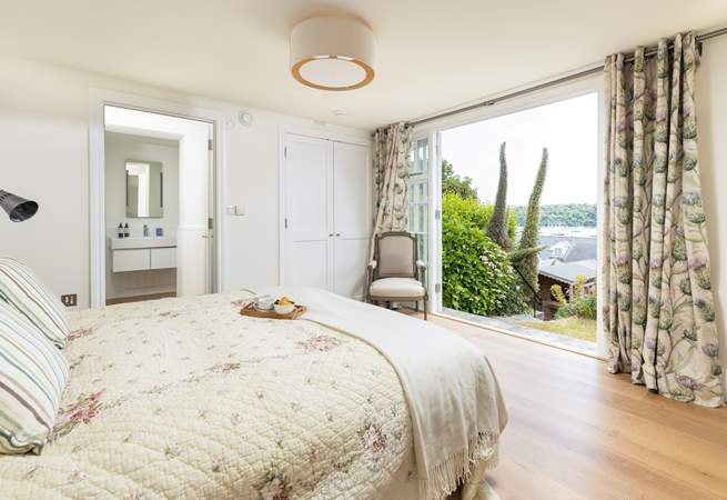 The beautiful lower ground floor bedroom is accessed via external steps through the garden and has a king-size double bed and en suite shower-room. 