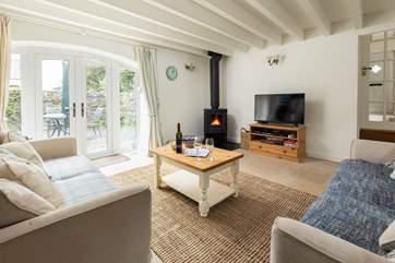 Gentle warmth from the log-burner keeps you toasty. There are classic games to keep you entertained in the evenings.