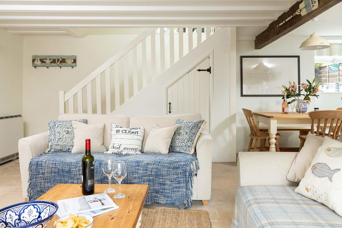 This cottage has an open plan kitchen, living and dining area, perfect for catching up with your loved ones!