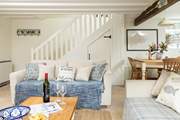 This cottage has an open plan kitchen, living and dining area, perfect for catching up with your loved ones!