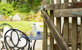 This little bistro table is on the garden side of Barn Cottage, the perfect spot for an afternoon aperitif. - Thumbnail Image