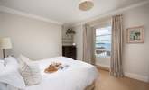 Take a little time in your super-king bed to enjoy the sea views from under the duvet in bedroom one. - Thumbnail Image