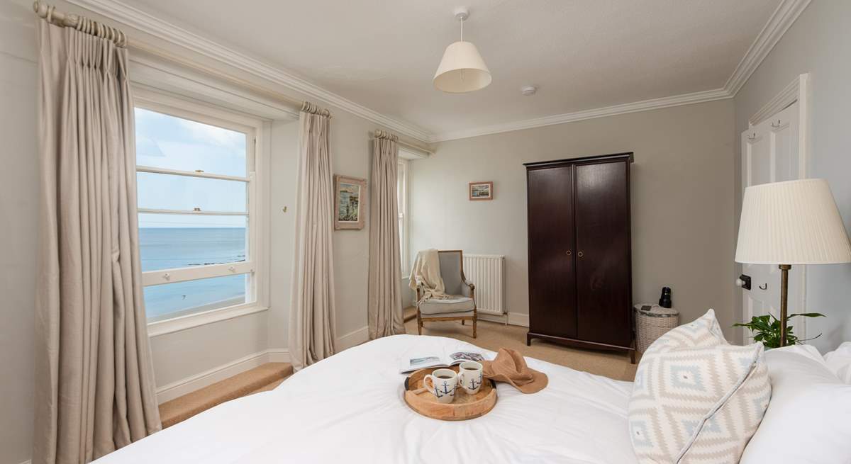 Sea views from both sides of the bed.