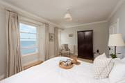 Sea views from both sides of the bed.