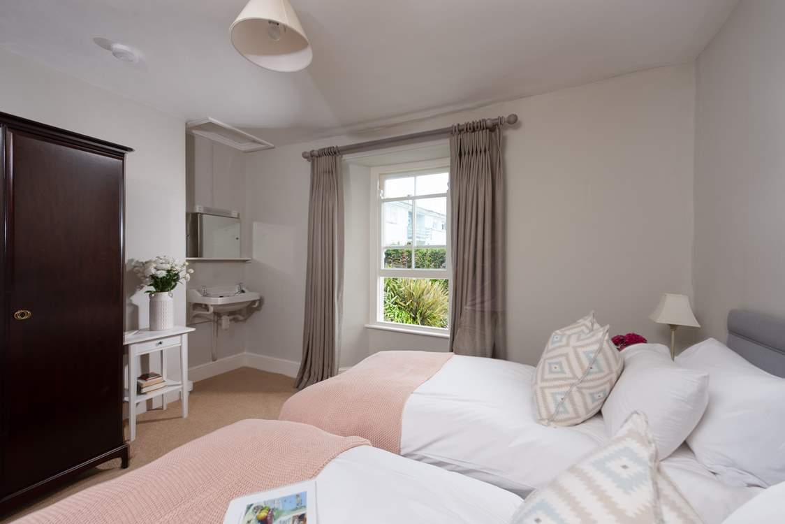 The twin bedroom is a lovely room for adults or children.