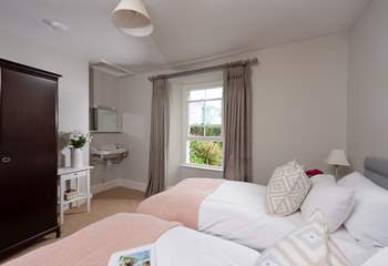 The twin bedroom is a lovely room for adults or children.