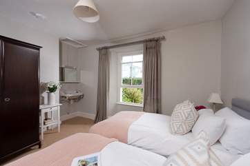 The twin bedroom is a lovely room for adults or children.