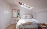 Bedroom three features a double bed. Please mind your head on the sloping ceiling. - Thumbnail Image