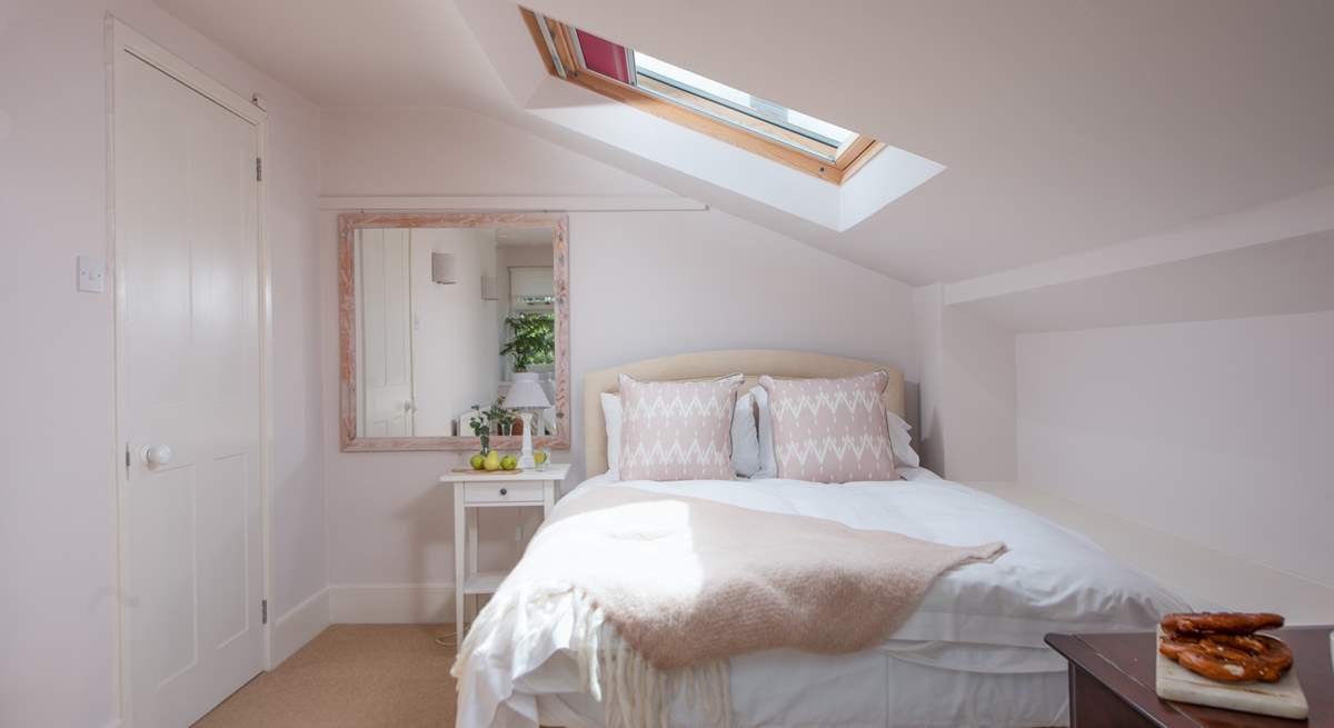 Bedroom three features a double bed. Please mind your head on the sloping ceiling.