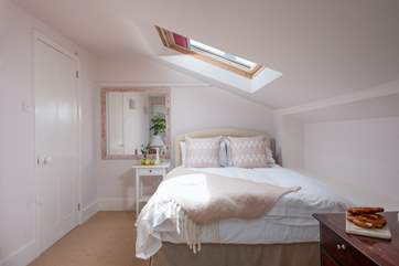Bedroom three features a double bed. Please mind your head on the sloping ceiling.