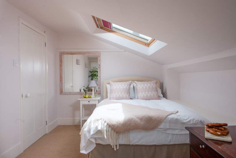 Bedroom three features a double bed. Please mind your head on the sloping ceiling.