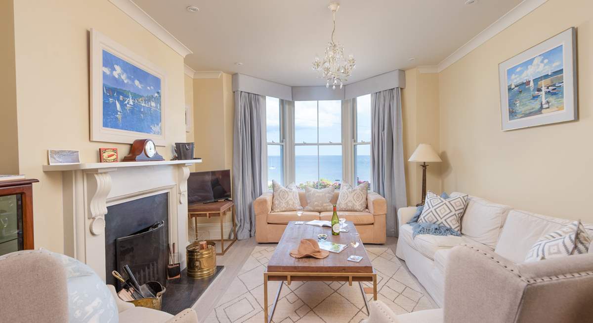 Relax in comfort in the lovely sitting-room, just look at the view!