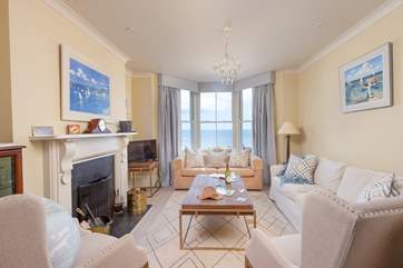 Relax in comfort in the lovely sitting-room, just look at the view!
