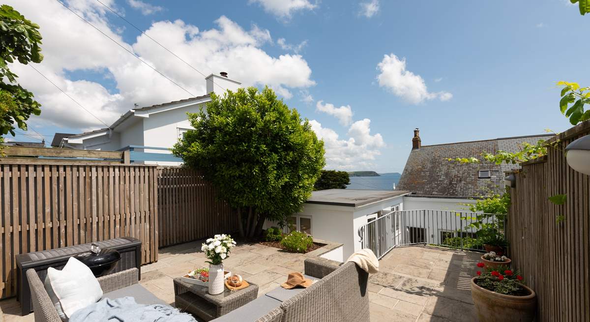 The raised terrace to the rear of the house, another great spot to spend time.