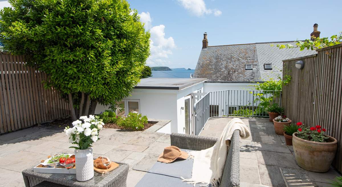 The raised terrace to the rear of the house, another great spot to spend time.