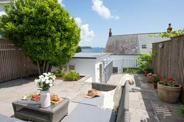 The raised terrace to the rear of the house, another great spot to spend time.