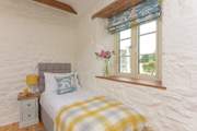 Sweet bedroom 3 has a lovely view of Pengersick Castle.