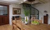 The large farmhouse dining-table lies at the other end of this room and is the perfect spot for long leisurely lunches and more formal dinners. - Thumbnail Image