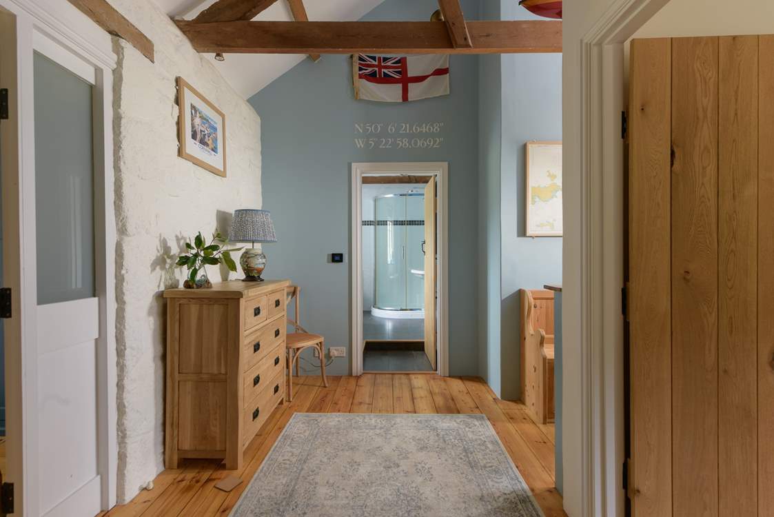 The spacious landing is flooded with natural light.