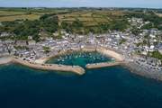 Further along the coast the magical village of Mousehole awaits.