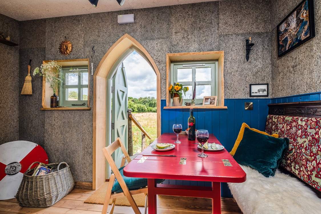 The sweet little table folds away to utilise the space.