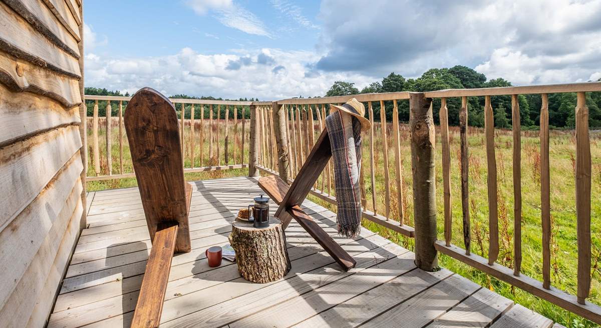 Begin your day with a freshly brewed pot of coffee on the sun-soaked decking.