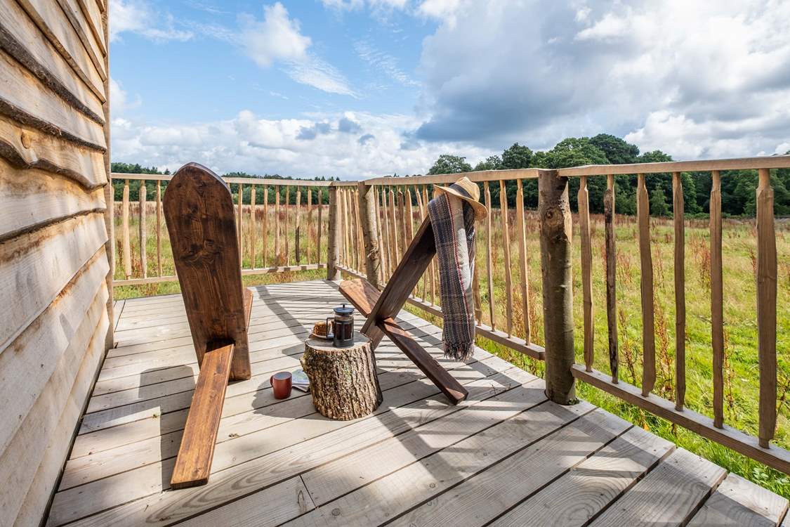 Begin your day with a freshly brewed pot of coffee on the sun-soaked decking.