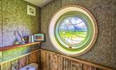 This beautiful stained glass window depicts the winding path through Powdermill Wood towards Battle.  - Thumbnail Image