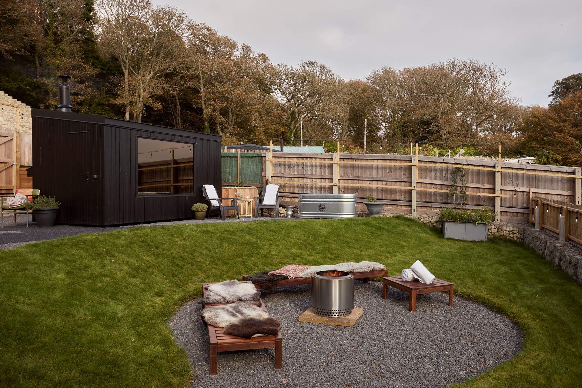 Enjoy a taste of Scandi living with the wood-fired sauna, cold plunge pool, and warming fire pit...