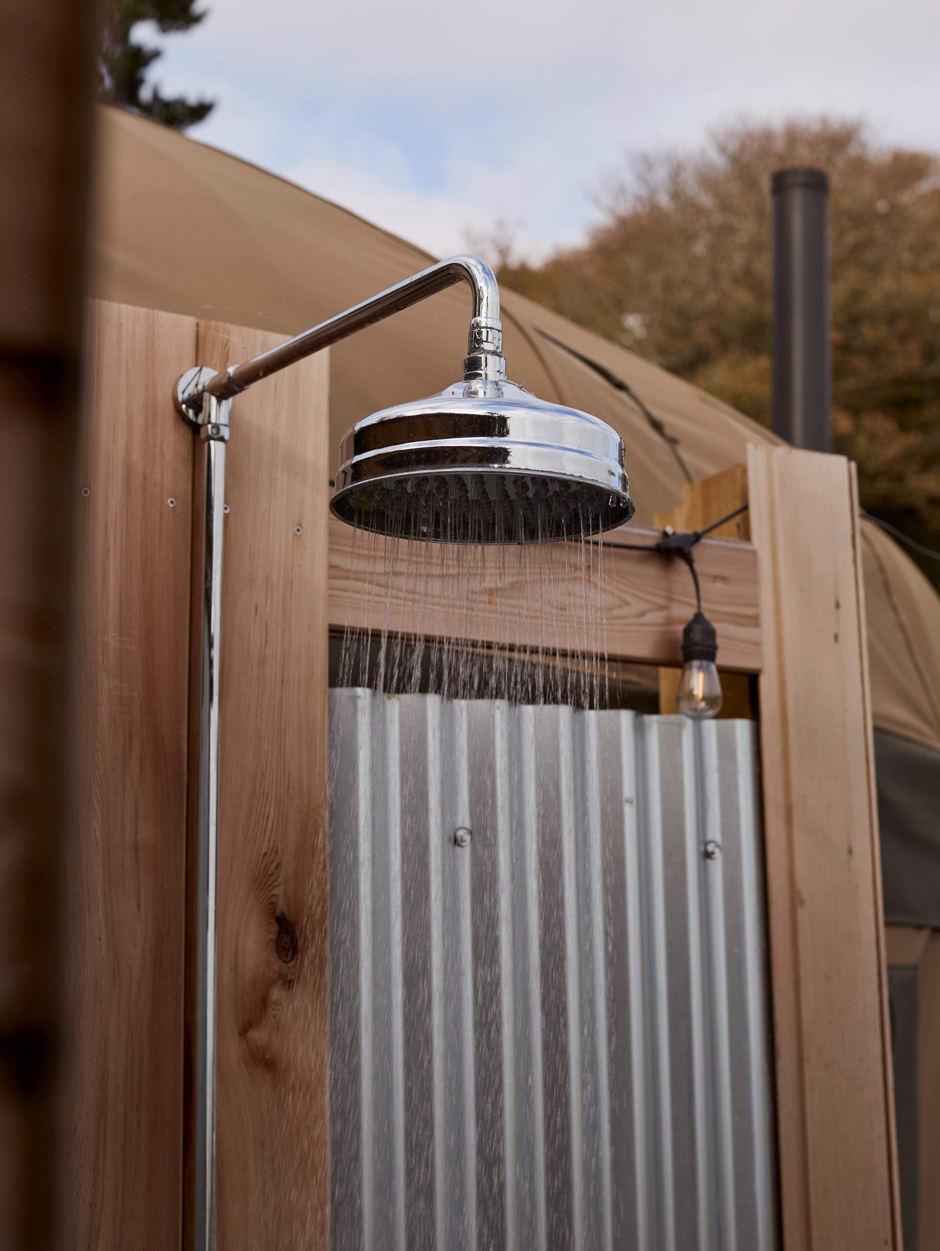 Rinse off in the heavenly open-air rainfall shower.