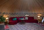 Step into the relaxation yurt to embrace a world of tranquillity. 