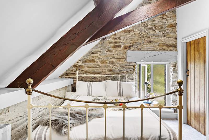 A charming room with exposed beams.