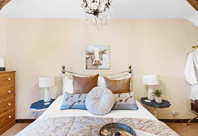 A sumptuous king-size bed in the double bedroom.