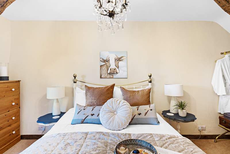 A sumptuous king-size bed in the double bedroom.