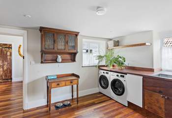 Just off the kitchen you will find a utility-room fit for a king!
